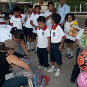 Tanya Jones and Page Cameron distribute gifts for Christmas in 2008